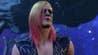 A close-up of Bertie's character in Baldur's Gate 3. They are a white-skinned human male with long blond hair, dipped in pink at the bottom. They have black rings around their eyes and black veins are visible beneath their skin.